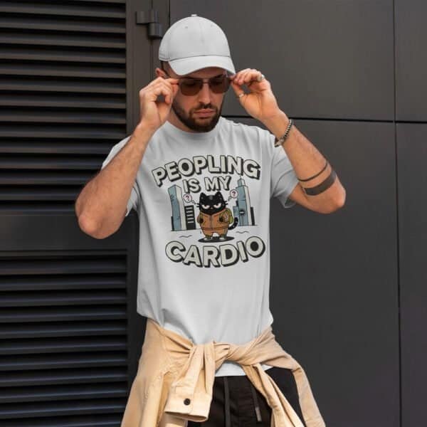 black-scowl-peopling-cardio-white-tee-man-casual Casual wear: Man in a white 'Peopling is my Cardio' t-shirt and baseball cap.