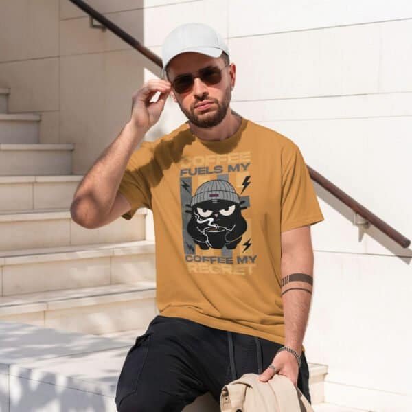 coffee-fuels-regret-tshirt-toast-male-model Male model wearing the Toast colored coffee cat graphic tee. The ultimate anti-motivation coffee shirt.