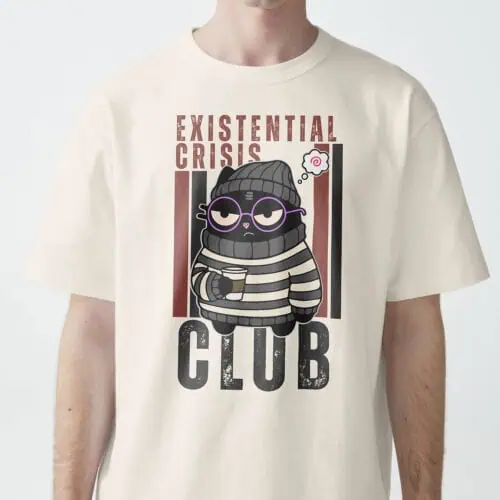 Close-up of man wearing vintage white "Existential Crisis Club" t-shirt with funny cat illustration and existential humor text.