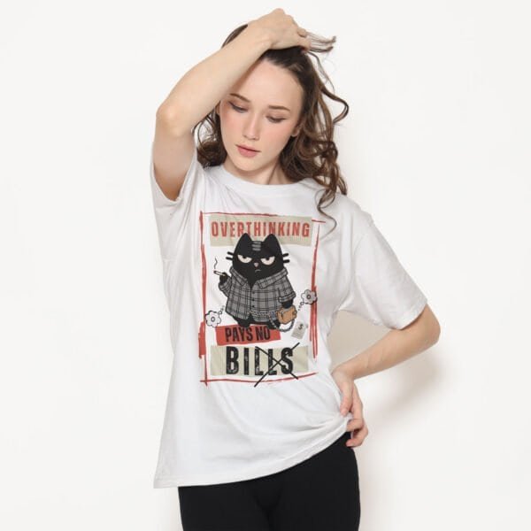Woman wearing white "Overthinking Pays No Bills" graphic t-shirt. Perfect shirt for chronic overthinkers.