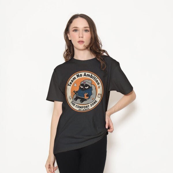 team-no-ambition-tshirt-dark-female-model Female model in the dark gray/black version of the comfort zone cat shirt.