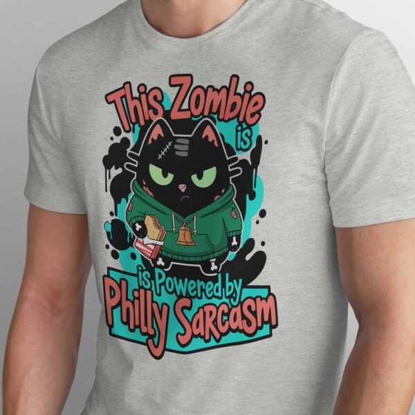 Close-up of the zombie cat artwork showing a Liberty Bell necklace and a Philly cheesesteak in hand.