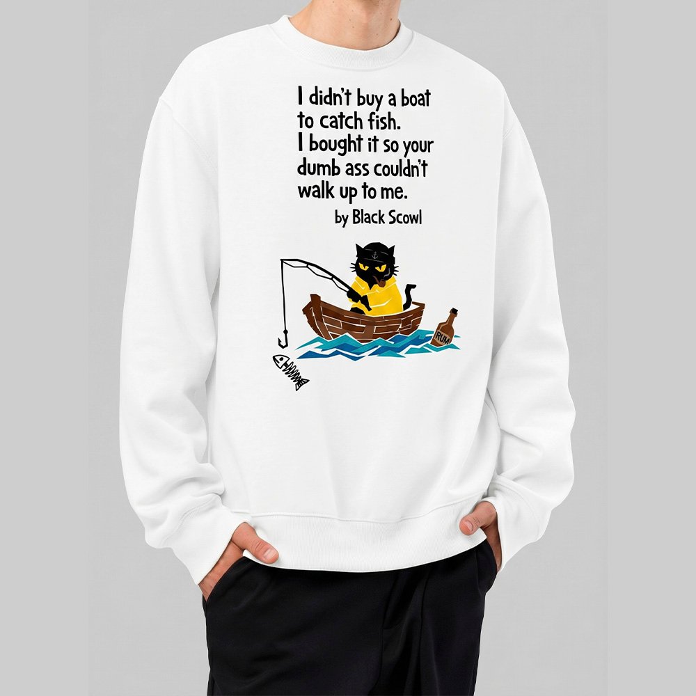 Male model wearing a white Black Scowl heavyweight oversize sweatshirt with a misanthropic quote about buying a boat to avoid people and a cynical fishing cat graphic.