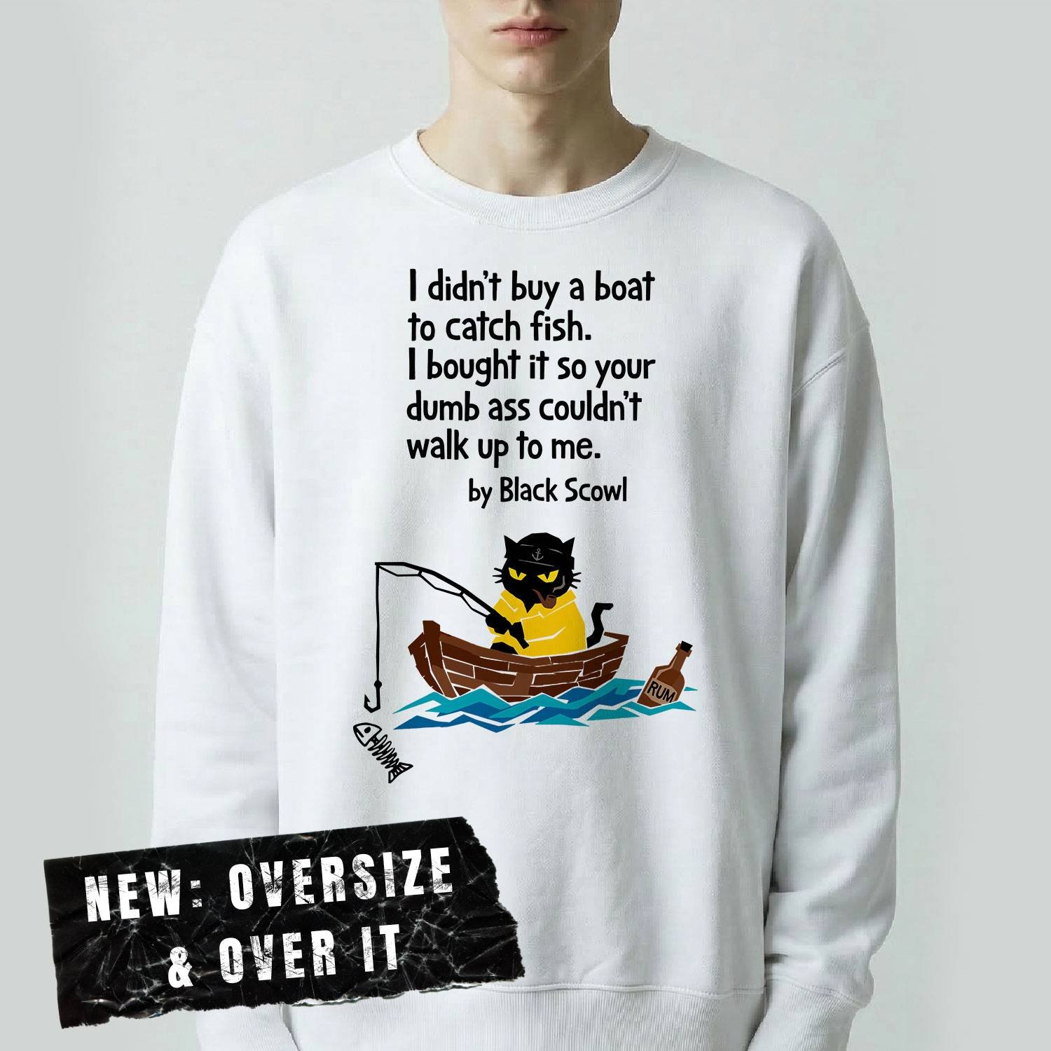 Male model wearing a white Black Scowl heavyweight oversize sweatshirt with a misanthropic quote about buying a boat to avoid people and a cynical fishing cat graphic.