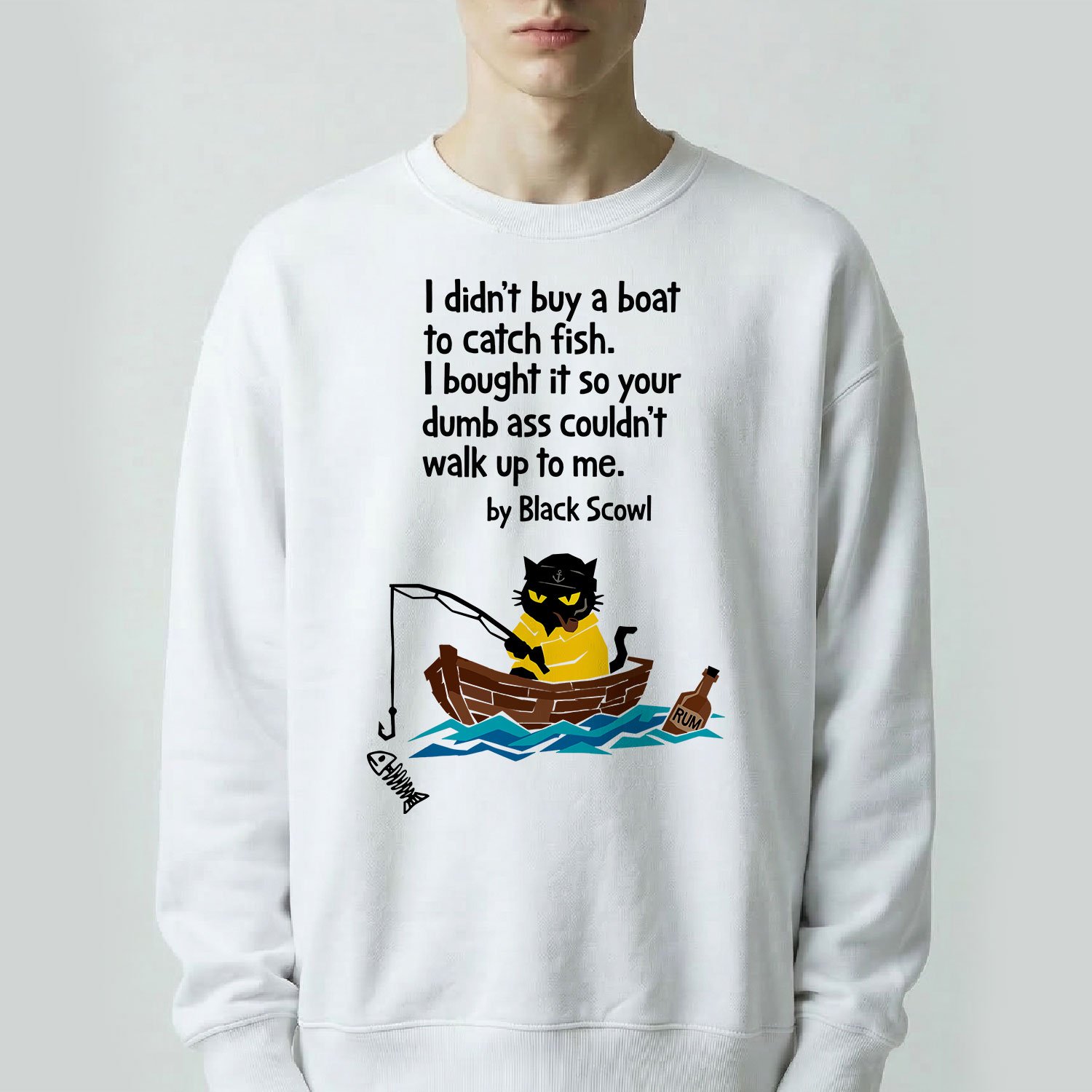 Male model wearing a white Black Scowl heavyweight oversize sweatshirt with a misanthropic quote about buying a boat to avoid people and a cynical fishing cat graphic.