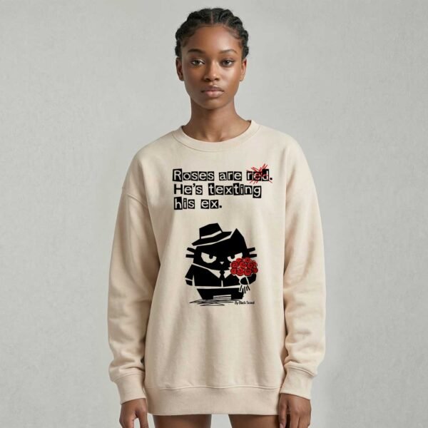 Woman modeling an aesthetic oversized streetwear crewneck featuring the dark humor quote Roses are red he's texting his ex by Black Scowl.