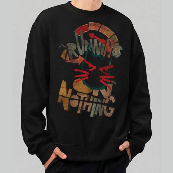 Front view of a male model wearing a Black Scowl black heavyweight crewneck featuring a distressed "Running on Nothing" urban graphic with a cynical cat character.
