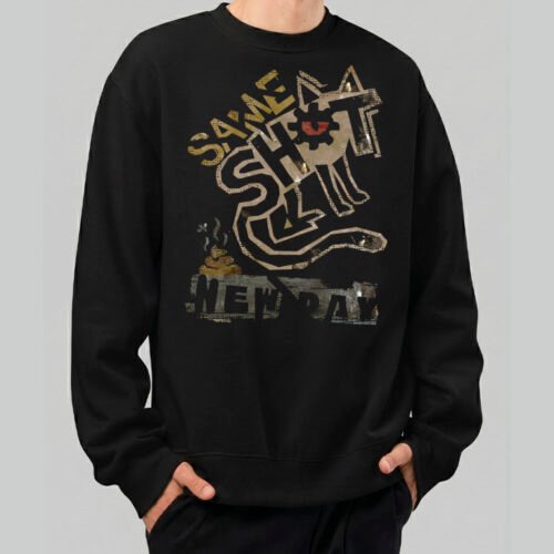 Front view of a male model wearing a Black Scowl black heavyweight crewneck featuring a distressed "Same Shit New Day" urban graphic and a cynical cat character
