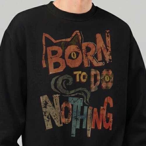 Close-up detail of the Black Scowl black sweatshirt showing the distressed texture and earthy tones of the Born to Do Nothing typography and graphic design.