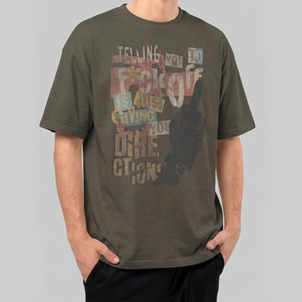 Front view of a male model wearing a Black Scowl charcoal heavyweight t-shirt featuring a distressed "Telling You To F*ck Off Is Just Giving You Dire Directions" graphic.