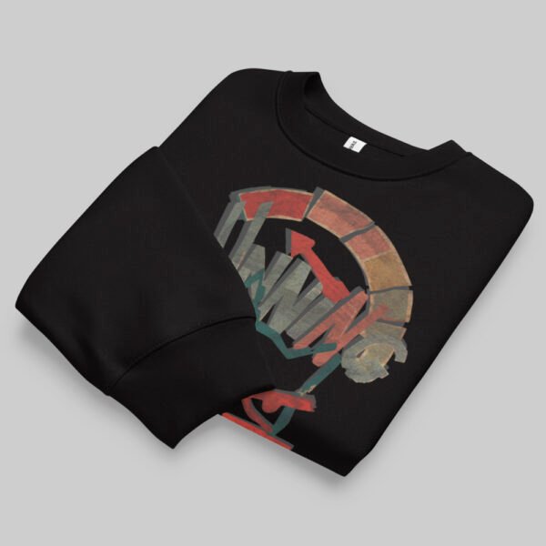 A professionally folded Black Scowl black crewneck sweatshirt on a gray background, showcasing the upper part of the graphic print and collar detail.
