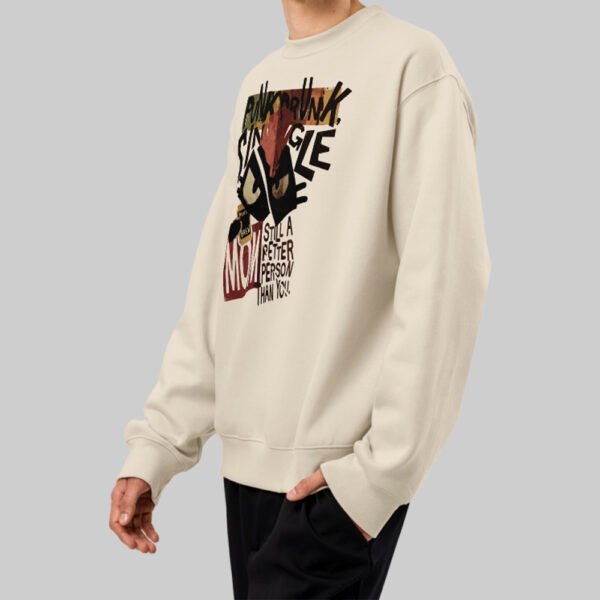 Side angle view of a model wearing the Black Scowl graphic sweatshirt, showcasing the existential streetwear style in a beige color.