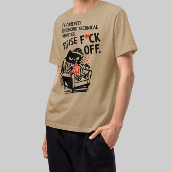 Side view of a model wearing a Black Scowl sand oversized unisex shirt, highlighting the relaxed streetwear fit and premium fabric quality.