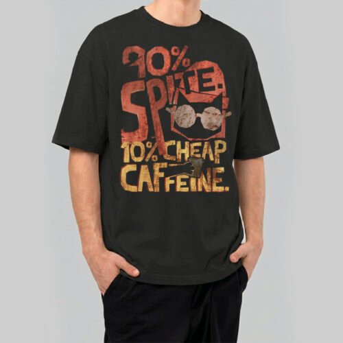 Model wearing a Black Scowl premium 220g oversized black t-shirt with a distressed graphic featuring a cat with sunglasses and '90% Spite 10% Cheap Caffeine' text.