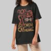 A female model wearing the Black Scowl black heavyweight graphic tee with a modern avant-garde fit and cynical urban aesthetic.