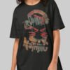Close-up of a premium heavy cotton oversized tee from Black Scowl with a cynical black cat design and 'Running on Nothing' slogan for a modern dark humor look.
