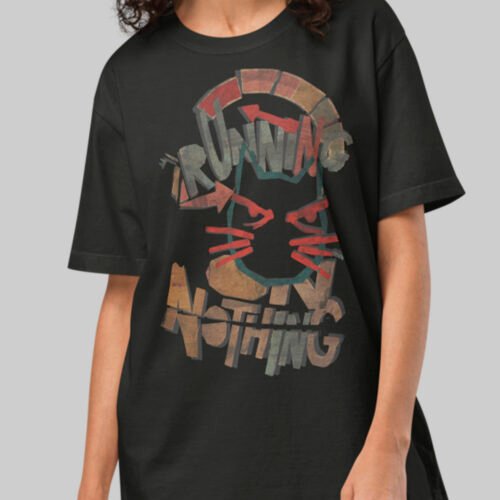 Close-up of a premium heavy cotton oversized tee from Black Scowl with a cynical black cat design and 'Running on Nothing' slogan for a modern dark humor look.